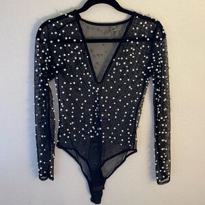 Sheer faux pearl embellished bodysuit from Laurie Belle’s